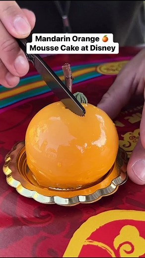 The Mandarin Orange Mousse Cake is one of our favorite desserts at this year’s Lunar Festival event at Disney! 🍊🍰 BeastlyAppetite | Foodbeast