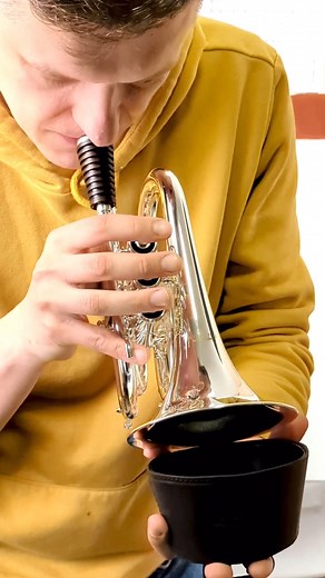 Playing on pocket trumpet with plunger mute by MG Leather Work! . Our leather plunger mute combines convenience with well-thought characteristics for improving your performance. . Due to the leather layer inside, the mute provides a much sharper sound than trumpet mutes with the textile inside layers. . The properties of leather help to reflect the sound much better and achieve more interesting sonic effects. What you definitely notice during the practice is more accuracy and rough sounding. Lin