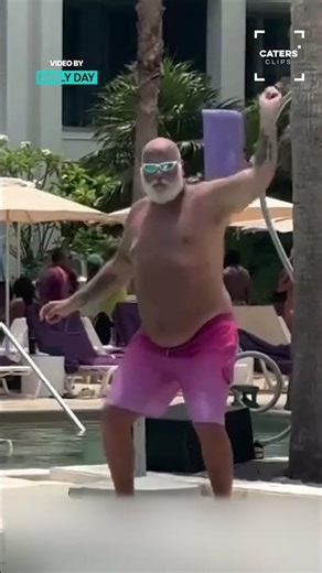 Man Dancing By The Pool