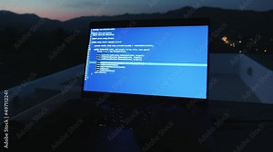 POV first-person portrait programmer developer programmer freelancer writes blue code at a laptop outside the office on tropical mountains background in the night