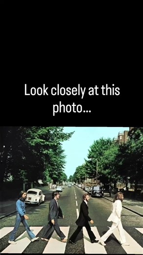 🍏 At first glance it’s just four men crossing a street. But Beatles fans have spent decades looking closely at this photo and spotting strange little details hidden in plain sight. The Abbey Road cover was taken on August 8, 1969 in just a few minutes while traffic was stopped. More than 50 years later, people are still studying it… and still noticing things they missed the first time. #Beatles #AbbeyRoad #BeatlesFans #TheBeatles #JohnLennon