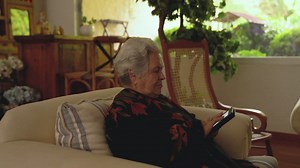 Elderly woman reading digital book Free Stock Video Footage