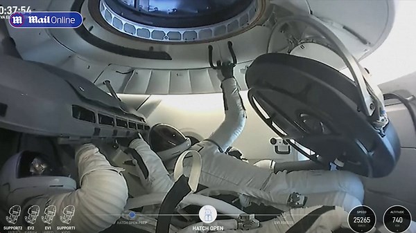 Historic celebrations inside SpaceX HQ as hatch fully opens