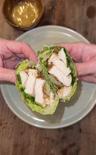 day 6/20: chicken caesar salad wraps I love a chicken caesar so much that we had to figure out to make it healthier and this healthier caesar dressing recipe is delicious while also prioritizing whole foods 🥬🌯🐠 Ingredients Spinach tortilla Chicken breast 2 Tbsp Dijon 2 Tbsp worchestshire Salt pepper Romaine lettuce Bread crumbs Olive oil For the healthier caesar: 1/3 cup olive oil 1 Tbsp Dijon mustard 1 tsp worchestshire 1/4 lemon juiced 2 cloves garlic 1/2 pack anchovies or 1 tsp anchovy pas