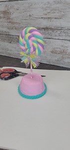 These are so fun to make for your candyland decor. #candyland #lollipops #gingerbread #fakebake #foamclay #christmasdecor #diy #crafting #dollartree #christmascrafts #Christmas #christmascrafts | UpnGrowing