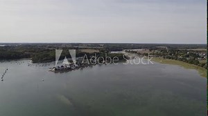 Island of Conleau near Vannes Northern France with beachfront resorts, Aerial dolly out shot