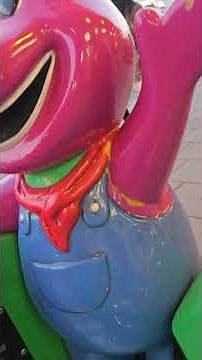 Barney tractor kiddie ride