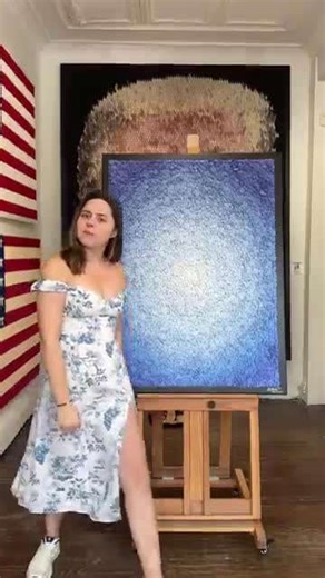 Abstract blue canvas reveals thousands of tiny flowers up close