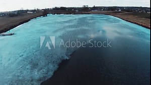 Close up copter view of beautiful lake after winter forest. Top view. Nature, beautiful, travel, drone, scenic, panorama, tree, wilderness, natural, environment, wood, countryside. Slow motion