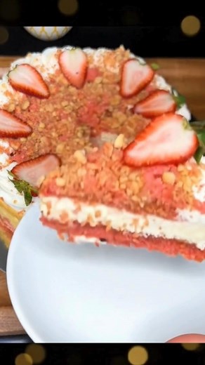 Strawberry Crunch Cheesecake 🍓✨ A luscious layered cheesecake featuring strawberry cake, creamy baked cheesecake, and a sweet strawberry crunch topping. It’s the perfect blend of creamy, crunchy, and fruity! Ingredients Whole Cheesecake Layer 3 packages cream cheese 1/2 cup granulated sugar 3 large eggs 1/2 cup sour cream Juice of 1 lemon 1 tablespoon vanilla extract No-Bake Cheesecake Layer 1 package cream cheese 1/3 cup granulated sugar 1/4 cup whipping cream 1 tablespoon vanilla extract Stra