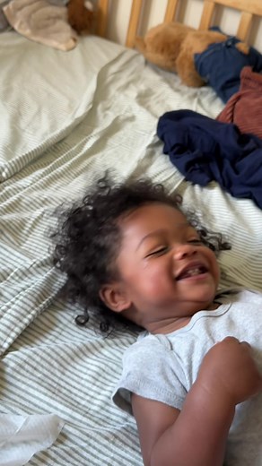 Toddler's Little Smile Watching Himself: Heartwarming Moment