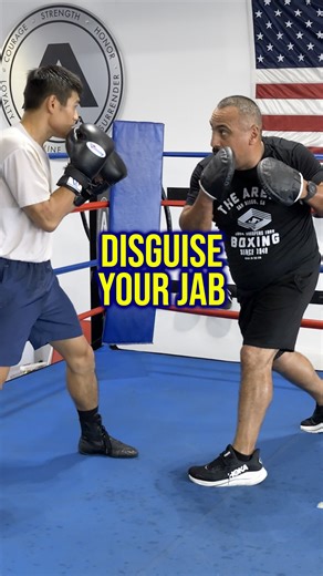 THE ARENA on Instagram: "Learn this deceptive boxing technique that will catch opponents off guard! The Arena’s Boxing Coach Joe Vargas @joe_hits demonstrates how to disguise your jab by using the same hip rotation you’d normally use to load up a power hook. The Setup: ✅ Rotate hips back like you’re throwing a hook ✅ Opponent sees the telegraphed movement and raises their guard high ✅ Fire a straight jab right through their defense! This advanced boxing drill works even better when you throw a f