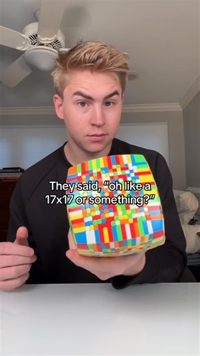 Captain Cuber on Instagram: "It’s pretty heavy #cubing #holyairball This is the Rubik’s cube sculpture created by Doug Powell @dougpowellartwork using computer keys! Hit the link in my bio to learn how to solve the cube!"