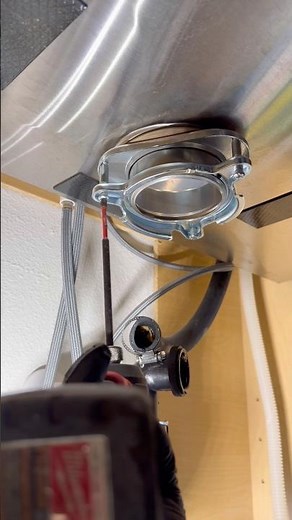 My apprentice installs garbage disposal snap rings like a pro