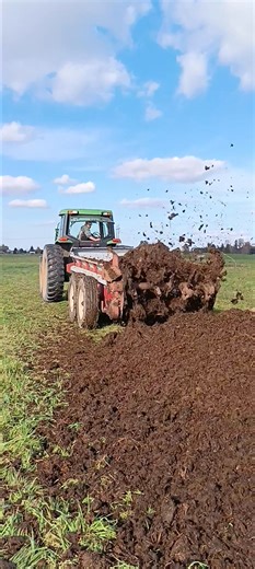 The you know what really hit the fan on the farm today! Eli is the Compost Master on our farm. Here, he is running some started compost through a manure spreader. What you see flying out the back consists of straw, bedding, manure, scraps like apple & potato peels, etc. Running it through the spreader helps break up chunks and creates a nice pile. It might look like just a pile of brown crud but there will be lots of activity going on inside that pile all winter. Micro-organisms within will brea