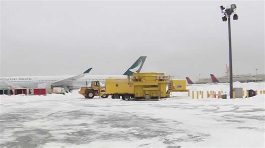 Logan Airport digging out from snow as operations slowly resume after winter storm