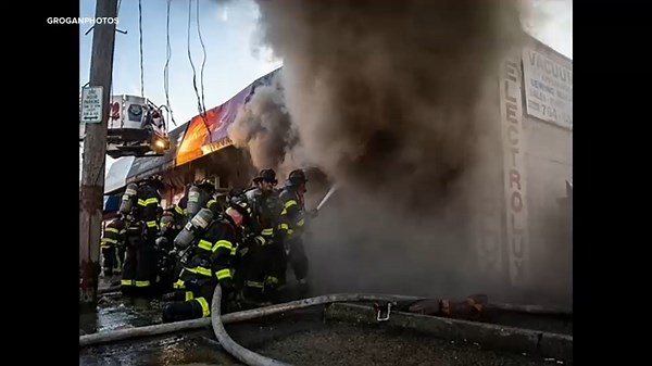 Flames destroy vacuum store at Long Island strip mall