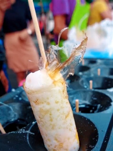 Discover Thailand's Satisfying Egg Roll Machine