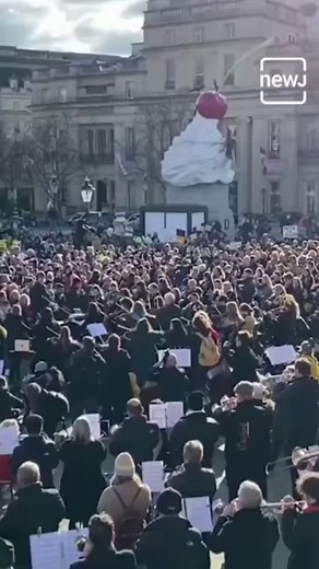 14K views · 101 reactions | Over 200 classical musicians joined an orchestral flashmob in London in solidarity with Ukraine #Ukraine #russianinvasion #Flashmob | Briefly | Facebook