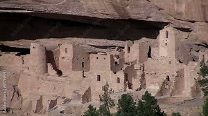 Pan across ancient American Indian dwellings at Mesa Verde, Colorado.