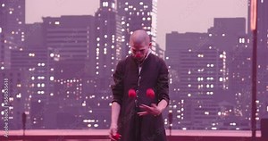 Mime or clown juggling red balls in the background of the modern city skyline at night.