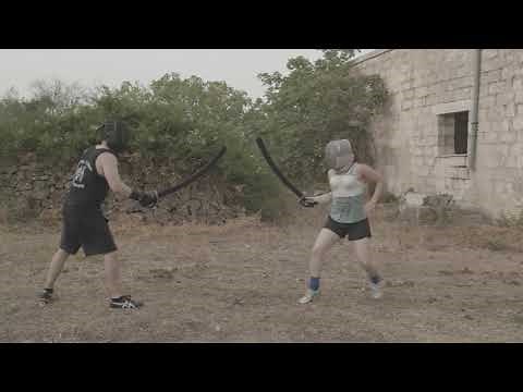 HMB fighter vs Olympic fencer - duel with HEMA padded sabres