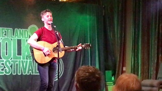 12K views · 256 reactions | Shetland Folk Festival 2019: Cullivoe singer songerwriter Barry Nisbet teaching an entertaining lesson in Shetland dialect during Friday's 'Stories Behind the Music' concert at the festival club in the Islesburgh Community Centre | Shetland News | Facebook
