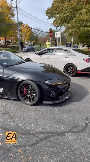 Black Toyota Supra with big Wing leads JDM car lineup.