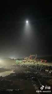 Rescue team in #Henan #Xinxiang uses drones to provide large-scale lighting. This is a new service developed by a company to provide lighting for emergency use. | BizInsight with Guan Xin