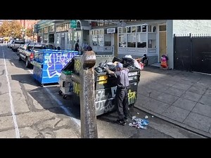 Waste Management front load garbage truck