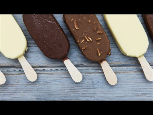 Popsicle sticks turned into a hexagon shelf that looks straight out of a design store