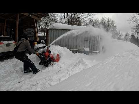 Honda HS928 Snowblower Clearing a Huge Snow Pile