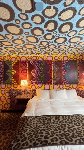 The Leopard Room at Saint Kate - The Arts Hotel in Milwaukee Wisconsin. Juuuust enough spots, if you ask me 😏 Such a fun hotel - we’ll definitely come back on our next visit to Milwaukee! They gave us a link for free parking and a copy of Hotel Kitsch at check in so lmk if you’re gonna book your trip 🥰 Thank you to @saintkatearts for hosting us! #giftedstay #lonmichels #hotelroom #hoteldesign #interiordesign #maximalistinteriors #wtf #coolhotels | A Pretty Cool Hotel Tour