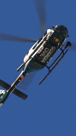 Spain Guardia Civil Helicopter flying over La Línea, Spain on a recon mission to stop narco trafficking coming from Africa to Europe across The Strait of Gibraltar. | The Spain Gibraltar Channel