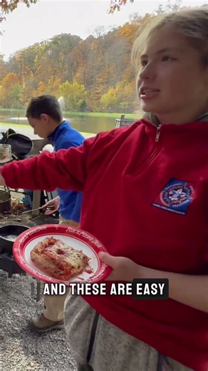 A Girl Scout can carry these chuck boxes