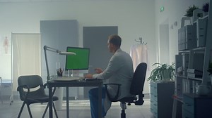 Doctor using green screen computer consulting patient online in hospital office. Free Stock Video Footage