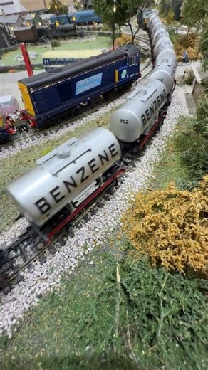 Weathered Hymek class 35 pulling Benzene wagons past the DRS class 20.