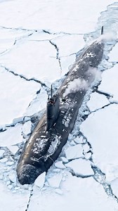 Surfacing in the frozen abyss. The Virginia-class (Block V) submarine proves that nowhere is off-limits for the US Navy. Breaking through thick Arctic ice requires extreme hull strength and precision. Is the North Pole our new frontline? 🇺🇸 . . #military #usa #virginiaclass #submarine #arctic #usnavy #nuclear #stealth #defense | Military Addict