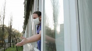 Man Medical Mask Opens Window Waving Stock Footage Video (100% Royalty-free) 1049970562 | Shutterstock