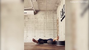 Bar Refaeli performs yoga stretches in crop top on Instagram