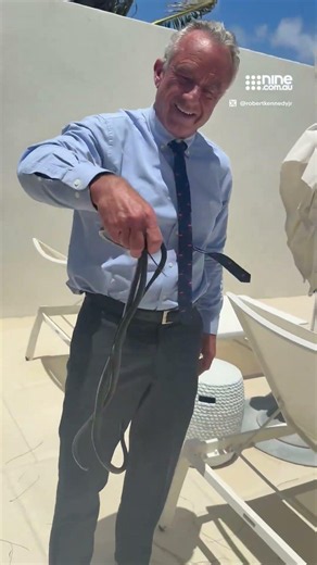 RFK Jr. grabs snakes on Dr Oz's patio, as his wife Cheryl Hines urged him to drop them.