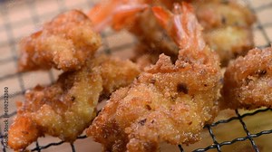 Breaded fried shrimp with a crispy crust, Very easy to prepare and you will enjoy delicious results. Episode from a series of video recipes for making breaded fried shrimp. Close-up, Slow motion
