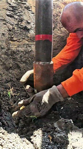 Helical Pier Screwing Deep Into the Soil | Close-Up Foundation Repair Short