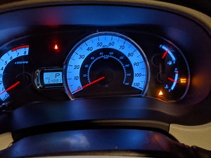 Orange triangle with exclamation.