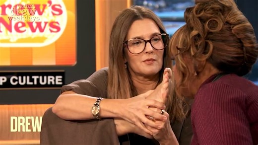 Drew Barrymore and talk show co-hosts SMELL her feet to prove they don't stink