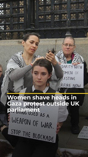 A group of women shaved their heads in solidarity with Palestinian women in Gaza, in a protest outside the UK’s Houses of Parliament. The protesters said many Palestinian women have been shaving their own hair due to the lack of water to wash with or even drink. | Al Jazeera English