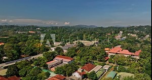 Peradeniya Sri Lanka Aerial v9 drone flyover University campus situated along the banks of the Mahaweli river capturing lush greenery and hillside landscape views - Shot with Mavic 3 Cine - April 2023