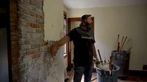 We found a hidden fireplace behind the wall