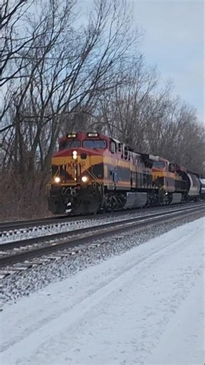 CSX empty oil train with solid KCS power leading elephant style blowing through snow! 121225
