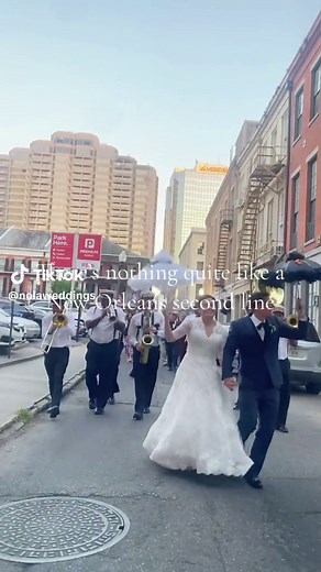 When in New Orleans 🎷 A second line is a famous New Orleans tradition that celebrates the newlyweds! The couple, family, and friends all dance through the streets behind a big brass band from the ceremony to the reception. If you’ve never been a part of one, we highly suggest it! Photographer: @brocatophotography Planner: @amandapriceevents Florist: @pickapetal Second Line Band: @kinfolkbrassbandnola Hair Stylist: @hairbybethnola Makeup Artist: @ahbmakeup #neworleanswedding #neworleanslife #wed